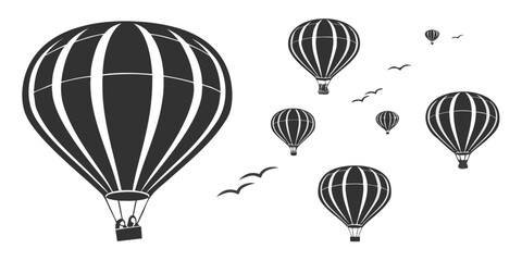 Hot air balloons floating gracefully in a clear blue sky with birds flying nearby Vector © rabbi