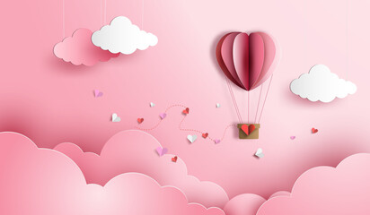 Valentine paper cut background with heart hot air balloon flying among clouds and floating hearts, cute pastel pink romantic love theme with copy space for greeting card or invitation. © Inlovehem