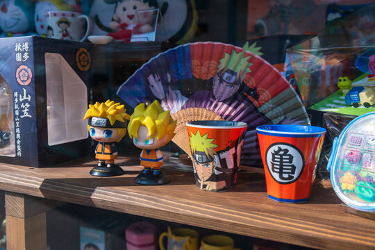 Naruto and Son Goku figures and cups at Yufuin store, Oita