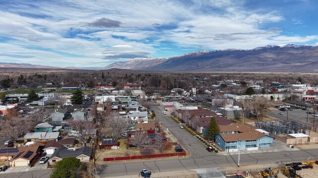 CALIFORNIA - 2.24.2026 - Excellent aerial footage moving over the city of Bishop, California, towards the mountains.