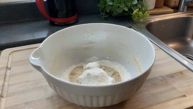 Pale-Colored Culinary Receptacles Containing Cereal Grains Positioned on a Domestic Food Preparation Surface