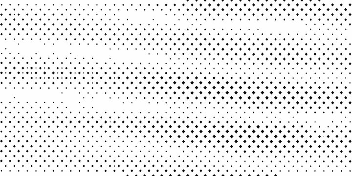 A dense allover pattern of small black diamonds on a white background