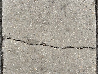 Horizontal picture of cracks smooth concrete surface. Single horizontal crevice.