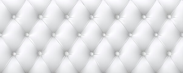 Fototapeta premium Close-up of a luxurious white upholstered surface featuring a diamond-pattern with button details