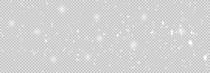 Freeze motion of natural snow falling on transparent background. Falling down real snowflakes