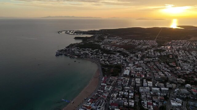 High Aerial Drone Flight Over Didim at Sunset with Greek Islands on Horizon