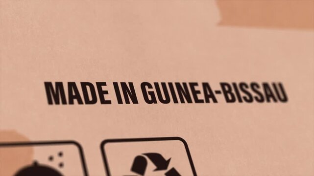 Made in Guinea-Bissau Label on Cardboard Box, Animated Guinea-Bissau Manufacturing Export Concept