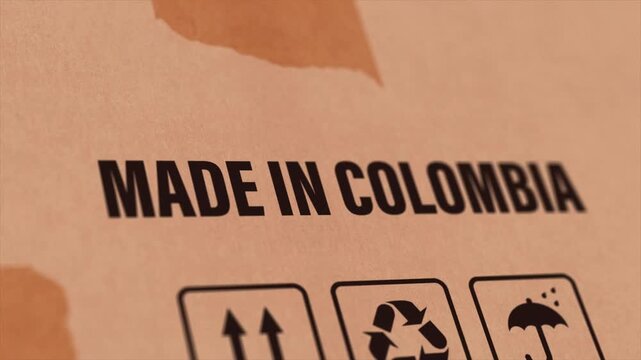 Made in COLOMBIA Label on Cardboard Box, Animated COLOMBIA Manufacturing Export Concept