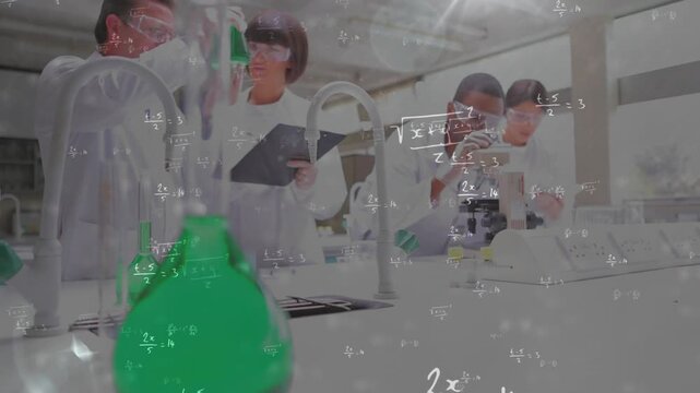 Camera pulling back showing green flask, instructor placing pipette while group observing demo