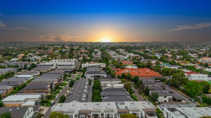 Panoramic Aerial Drone view of Inner Suburbs of Melbourne housing, roof tops, the streets and the parks, the roads and trees of Ascot Vale Moonee Ponds Brunswick Essendon and Maribyrnong in VIC Victor