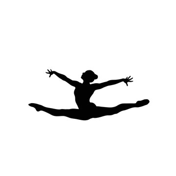 Silhouette of a female dancer performing a jump split.