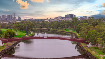 Obraz premium Panoramic Aerial Drone view of Inner Suburbs of Melbourne housing, roof tops, the streets and the parks, the roads and trees of Ascot Vale Moonee Ponds Brunswick Essendon and Maribyrnong in VIC Victor