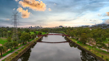 Obraz premium Panoramic Aerial Drone view of Inner Suburbs of Melbourne housing, roof tops, the streets and the parks, the roads and trees of Ascot Vale Moonee Ponds Brunswick Essendon and Maribyrnong in VIC Victor