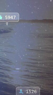 Vertical video: Coastal sea being overlaid with notification bubbles after shimmer, showing metrics