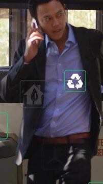 Vertical video: Man in suit walking on bus, causing cam following while rider tapping card boarding