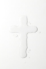 Fototapeta premium Christian cross made of water on a white background representing baptism purity and spiritual renewal