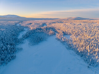 Stunning winter landscape in Akaslompolo, Lapland, Finland showcasing frozen beauty