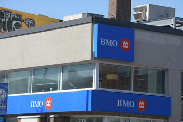 Naklejka premium exterior building facade and sign at BMO Bank of Montreal located here at 518 Danforth Av, Toronto