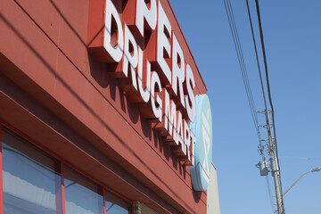 Naklejka premium oblique angle view of Shoppers Drug Mart, a pharmacy chain, located here at 812 O'Connor Dr, East York, Toronto