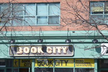 Naklejka premium exterior building facade and sign of Book City located here at 348 Danforth Av (inside Carrot Common), Toronto