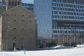 Naklejka premium The Old Don Jail (left) and Hennick Bridgepoint Hospital, east facing side, viewed from Broadview Av, Toronto