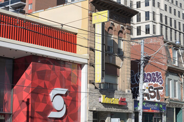 Naklejka premium looking east on Queen St W to Scotiabank branch, Korean Grill House, and Ginger Restaurant, Toronto