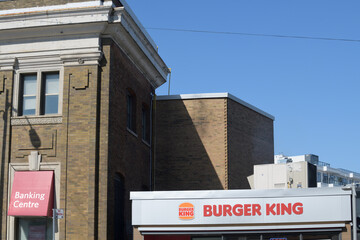 Naklejka premium exterior of Burger King, a fast food restaurant chain, located here at 98 Danforth Av (next to CIBC) near Broadview Av, Toronto