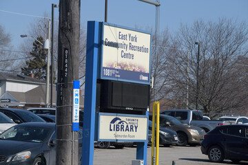 Naklejka premium roadside sign at East York Community Recreation Centre and Toronto Public Library - Todmorden Room Branch, 1081 1/2 Pape Av