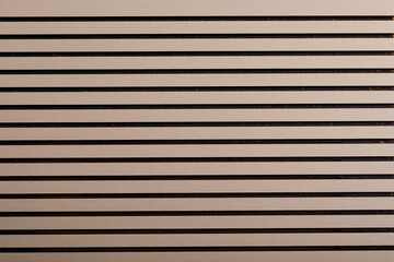 Obraz premium Close up shot of a textured surface with parallel lines, forming a graphic pattern. This image can be used as a backgrou