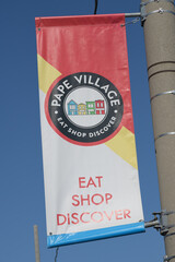 Naklejka premium close-up of a Pape Village BIA pole mounted banner, East York, Toronto