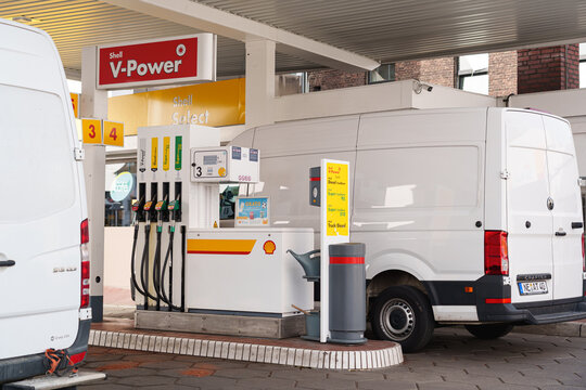 Shell V-Power petrol pumps and delivery vans refueling at gas station in D&uuml;sseldorf, Germany
