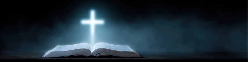 Naklejka premium Open bible with glowing cross above on dark misty background conveying spiritual light faith hope and divine presence