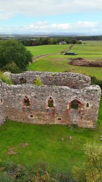 Drone Shot of Rait Castle Ruins, Rare 13th Century Hall House Architecture in Nairnshire Scotland