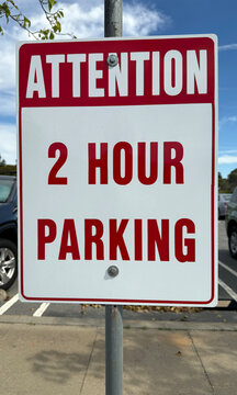 ATTENTION - 2 HOUR PARKING sign