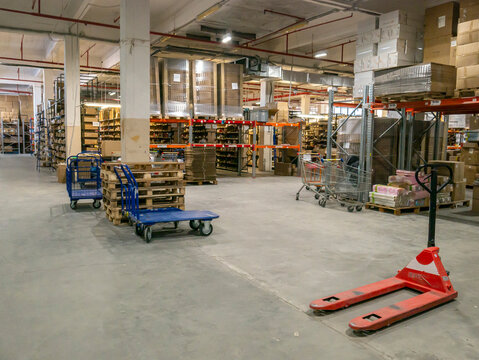Voronezh, Russia, December 24, 2025: A huge warehouse with boxes and pallets, industrial logistics