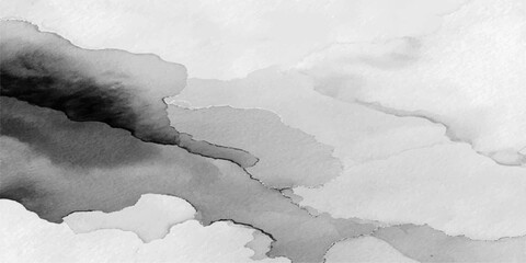 White clouds drift across a cold winter sky over a frozen river landscape featuring a snowy mountain and a white waterfall in nature © PAGLAA