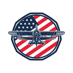 Vintage biplane on american flag badge emblem with red white and blue colors © Fahim