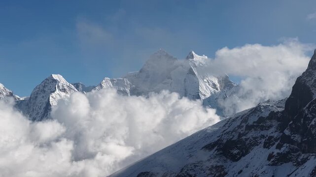 Flight in the clouds over The Khumbu Valley in The Himalayas, Nepal