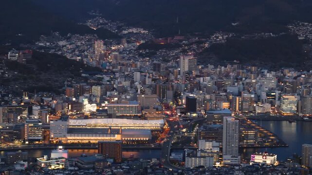 Nagasaki night panorama, Japan, aerial view, city skyline, port and mountains, seen from Inasa mount, Inasayama park, city illumination, Nagasaki prefecture, Kyushu island region, ropeway cable car