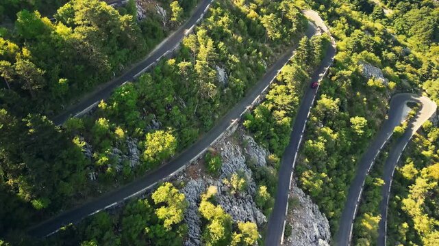 Aerial view of the famous Kotor Serpentine winding mountain road with numerous switchbacks in Montenegro
