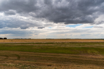 Brooding Skies Above Saskatchewan Farmland