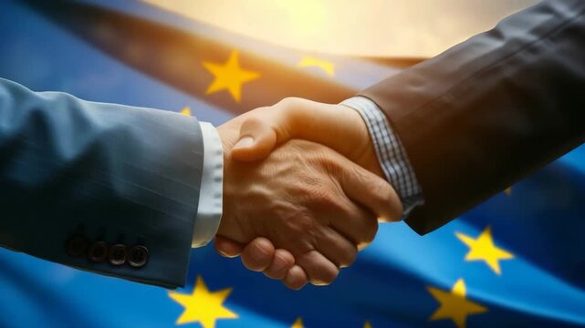 Successful businessmen handshaking after good deal. Business partnership meeting concept. Flag of European Union on a background.