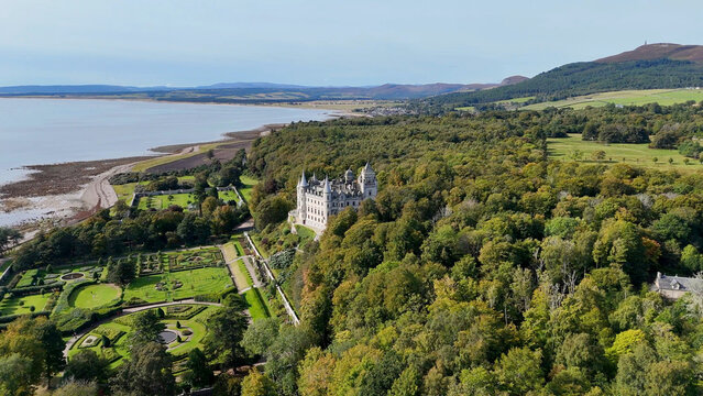 Magnificent Aerial View of Dunrobin Castle Architecture, a Historic French Ch&acirc;teaux Style Estate with Iconic Turrets and Spires in the Heart of the Scottish Highlands, Sutherland, UK.