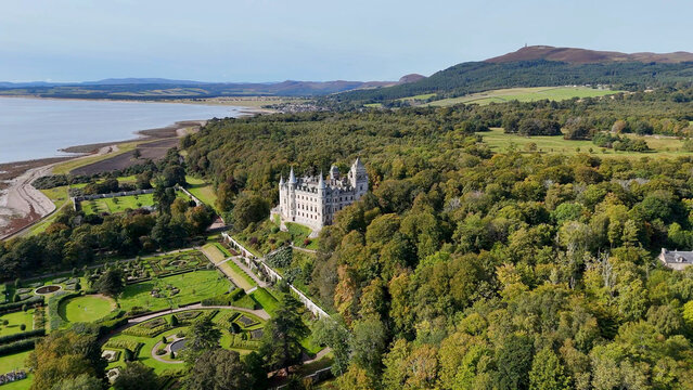 Magnificent Aerial View of Dunrobin Castle Architecture, a Historic French Ch&acirc;teaux Style Estate with Iconic Turrets and Spires in the Heart of the Scottish Highlands, Sutherland, UK.