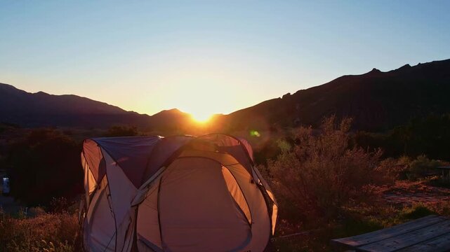 tent camping in the moutains at sunset slo motion footage no people
