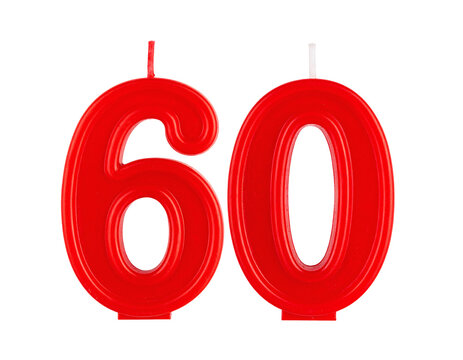 Bright red plastic number sixty birthday celebration candle set ready for illumination marking a special sixtieth anniversary or milestone event&nbsp;