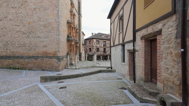 Pe&ntilde;aranda de duero main square with traditional castilian architecture and cobblestone pavement