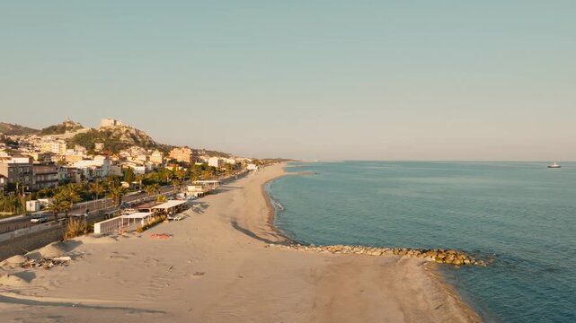 Roccella Ionica Beach in Calabria at sunset near the sea in Italy