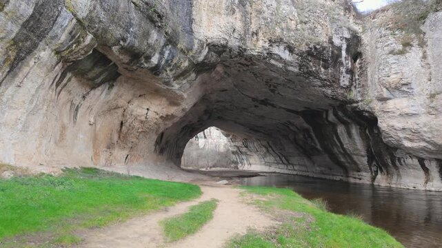 Puentedey village built on a natural limestone arch formed by the nela river