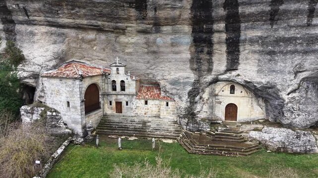 Ojo guare&ntilde;a hermitage built into rock cliff